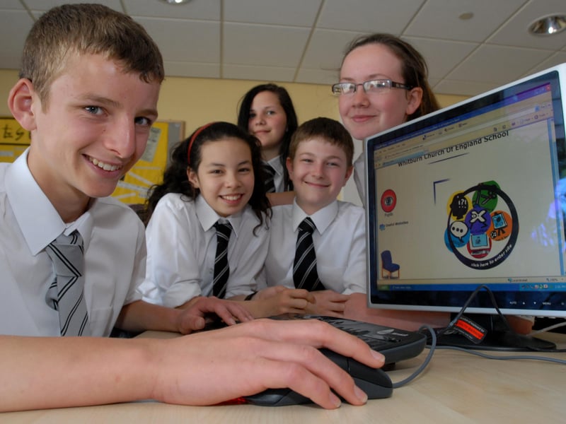 These pupils had every reason to smile after the school received an outstanding Ofsted report in June 2010.