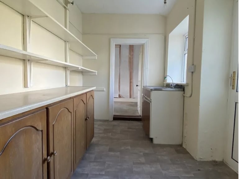 Click on NEXT below image to see more photos of the house and lands.