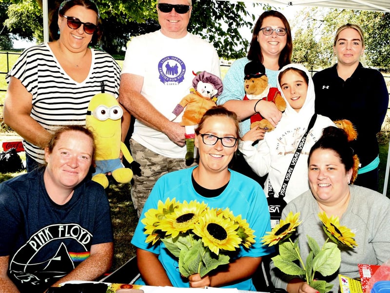 At the Teddy Bear's Picnic and Music Event at The Heath House in aid of Laois Offaly Families for Autism and Ukranian Refugees, were: LOFA volunteers - Mary Marshall, Sal O'Dwyer and Lizzy Walton. Back: Roisin Conroy, John Taylor, Sharon and Katie Powell and Aileen Ryan.. Photo: Michael Scully.