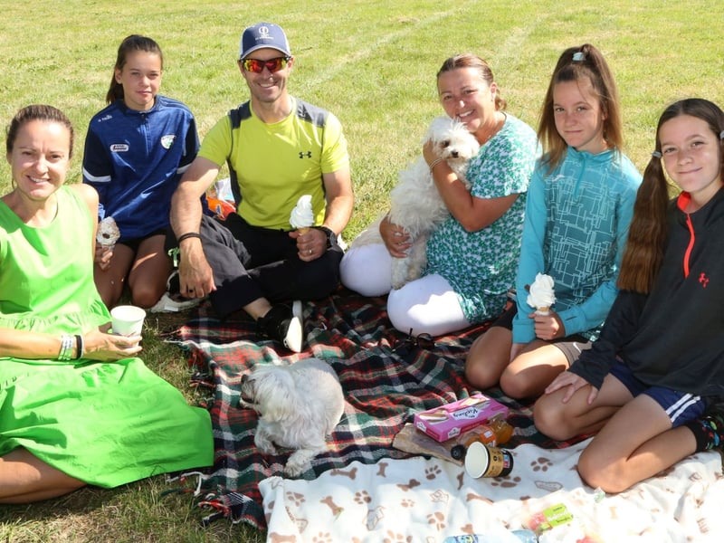 At the Teddy Bear's Picnic and Music Event at The Heath House in aid of Laois Offaly Families for Autism and Ukranian Refugees, were: Catherine, Cliona and Eamonn O'Flanagan,Therese Ryan, Lauren and Olivia O'Flanagan wit dogs Rolo and Aero. Photo: Michael Scully.