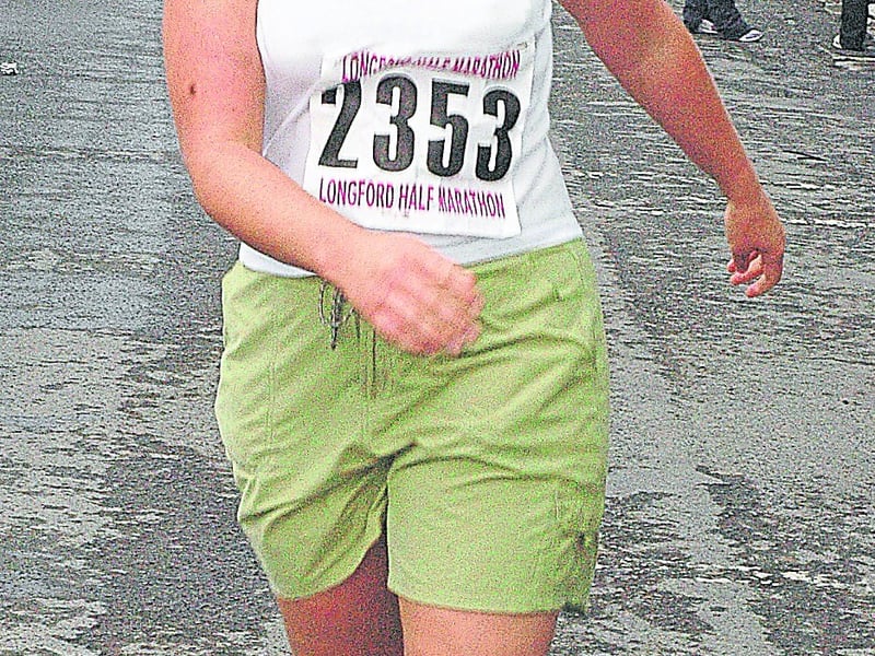 Marguerite McGauran, nee Harkin, crosses the finish line