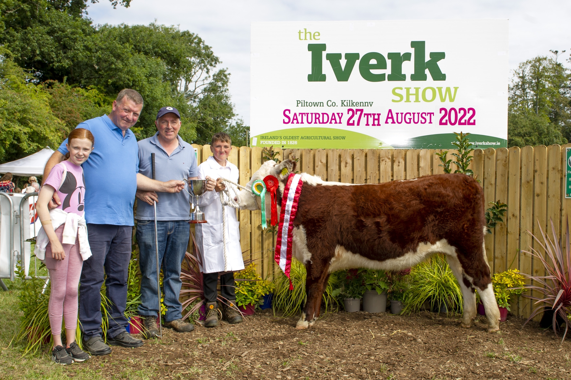 Scroll down to read a message from the Iverk Show organisers, and click 'NEXT' to see lots more pictures from the day. BELOW: Ger Walsh of Callan Co-op presenting the cup to the winner of the Hereford Class, for the Pedigree Hereford Bull or Heifer born after 01-07-21, at the Iverk Show. Rebecca Walsh, Ger Walsh, Callan Co-op, Pat Rohan and Seamus Rohan, Kilkenny. Picture: William Maher WMCM Photography Thank You On behalf of our President, Chairman and all the members of the committee I would like to thank everyone, yes everyone, who made (Saturday’s) Iverk Show a memorable occasion.The sun shone and you all attended and made our return show after three years a wonderful event.All we can say is a huge thank you. After all we have been through with Covid and as our chairman rightly said some of you experienced its worst, it was just fantastic to greet each other with a smile, a handshake, an embrace or just a nod of the head.To our sponsors, to our exhibitors, to our helpers – all volunteers – and to our visitors and guests from near and far, thank you.To the services, doctors, ambulance, Garda, vets, press, photographers, commentators, farriers, radio and any I have left out, thank you. We certainly could not run a show like it without you.To any of you whom the sun got the better of we wish you a speedy recovery.THANK YOU Norman StoreyPRO Iverk Show