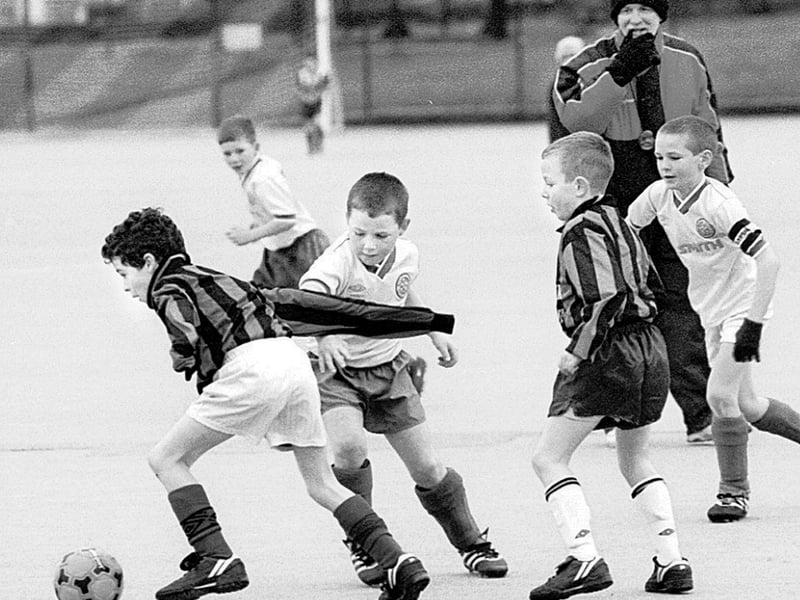Creggan Mini Soccer at the Bishop's Field. Referee Noel Moore keeps a close eye on the action during the Oxford v Foyle Harps game. Photo: Hugh Gallagher