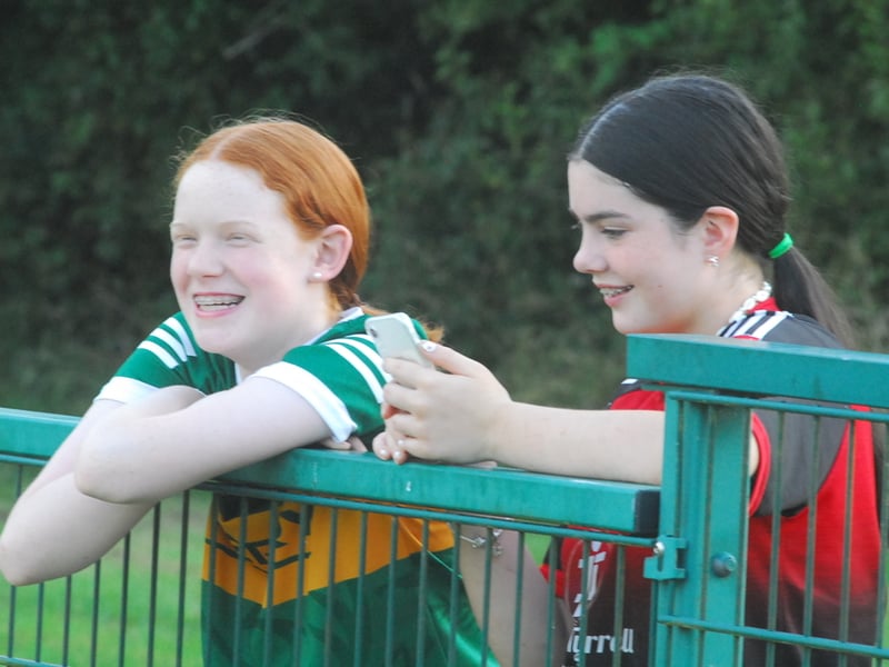   A flurry of scores in the final ten minutes gave Fenagh St Caillins a deserved if somewhat flattering 12 point victory over a wasterful Aughawillan in the first round of the Connacht Gold Leitrim SFC in Pairc Sean O'Laodain on Saturday evening and Observer photographer Willie Donnellan was there to capture some images from the fans enjoying the action in the sunshine ..... see who you can spot!