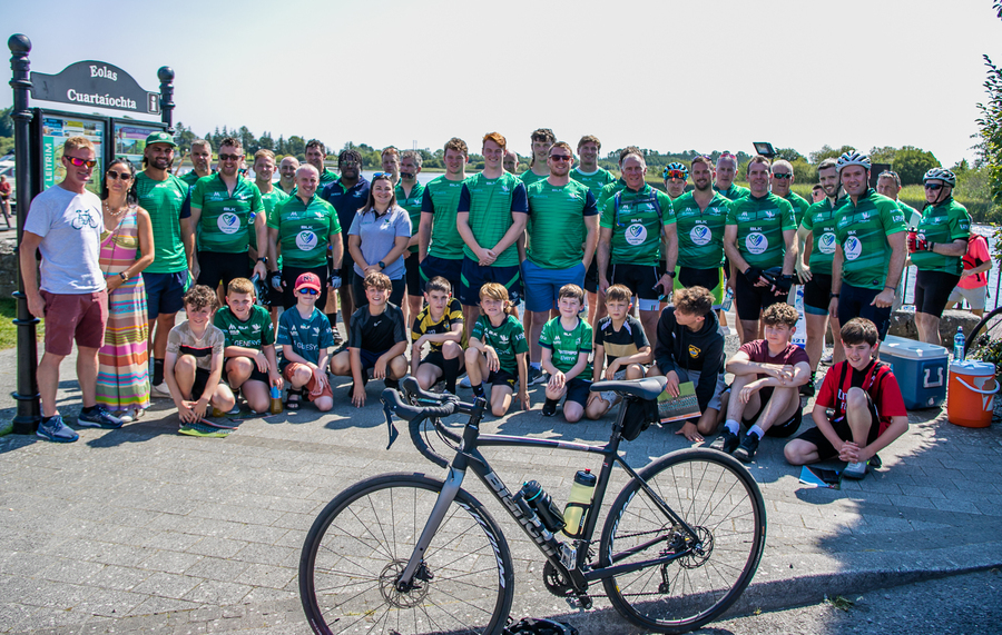 There was huge excitement at the quays in Carrick on Shannon last Saturday afternoon as a large contingent of the Connacht Rugby team and management along with some special guest riders had a stopover at Moon River on their Galway to Sligo Fundraising Cycle #care4claire. For approximately an hour, the cyclists and their support team and met with many of the local young players and signed autographs and jerseys before setting off on the road to Sligo where they finished their 218k trip across the five counties of the province later that evening. Varadkar says IRFU should listen to trans players ‘excluded’ from contact rugby Amongst the large group of cyclists and travelling players were Connacht Head Coach Andy Friend, Ireland playing legends Kieran Marmion and Eric Elwood and former Mayo, Roscommon and Offaly GAA manager John Maughan. The cycle began at The Sportsground in Galway in the early hours of Saturday morning and finished at Sligo RFC. The route took in all five counties with stops in Ballinrobe Co. Mayo, Ballyhaunis Co. Mayo, Frenchpark Co. Roscommon, Carrick-on-Shannon Co. Leitrim, and finally Ross and Claire’s home in Coolaney Co. Sligo, before the final stretch to Sligo RFC. The fundraiser was for 35-year old Sligo native Claire Carpenter who suffered a serious and life-changing event earlier this year. Claire suffered a stroke at her home in Coolaney.  'We don't stand still' on issues of player welfare, World Rugby vows After being rushed to the ICU unit of Beaumont Hospital she was placed in an induced coma for over a week following a life-saving operation. Claire is now thankfully on the road to recovery, however significant funds need to be raised to allow her to continue her rehabilitation in Dun Laoghaire, and eventually lead an independent life at home. Claire’s partner Ross Mannion is a Rugby Participation Officer with Connacht Rugby and was Head Coach of the Connacht Women’s team in 2021.  They have three children, Luke (14), Anna (10) and Zach (7).
