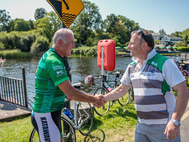 There was huge excitement at the quays in Carrick on Shannon last Saturday afternoon as a large contingent of the Connacht Rugby team and management along with some special guest riders had a stopover at Moon River on their Galway to Sligo Fundraising Cycle #care4claire. For approximately an hour, the cyclists and their support team and met with many of the local young players and signed autographs and jerseys before setting off on the road to Sligo where they finished their 218k trip across the five counties of the province later that evening. Varadkar says IRFU should listen to trans players ‘excluded’ from contact rugby Amongst the large group of cyclists and travelling players were Connacht Head Coach Andy Friend, Ireland playing legends Kieran Marmion and Eric Elwood and former Mayo, Roscommon and Offaly GAA manager John Maughan. The cycle began at The Sportsground in Galway in the early hours of Saturday morning and finished at Sligo RFC. The route took in all five counties with stops in Ballinrobe Co. Mayo, Ballyhaunis Co. Mayo, Frenchpark Co. Roscommon, Carrick-on-Shannon Co. Leitrim, and finally Ross and Claire’s home in Coolaney Co. Sligo, before the final stretch to Sligo RFC. The fundraiser was for 35-year old Sligo native Claire Carpenter who suffered a serious and life-changing event earlier this year. Claire suffered a stroke at her home in Coolaney. 'We don't stand still' on issues of player welfare, World Rugby vows After being rushed to the ICU unit of Beaumont Hospital she was placed in an induced coma for over a week following a life-saving operation. Claire is now thankfully on the road to recovery, however significant funds need to be raised to allow her to continue her rehabilitation in Dun Laoghaire, and eventually lead an independent life at home. Claire’s partner Ross Mannion is a Rugby Participation Officer with Connacht Rugby and was Head Coach of the Connacht Women’s team in 2021. They have three children, Luke (14), Anna (10) and Zach (7).