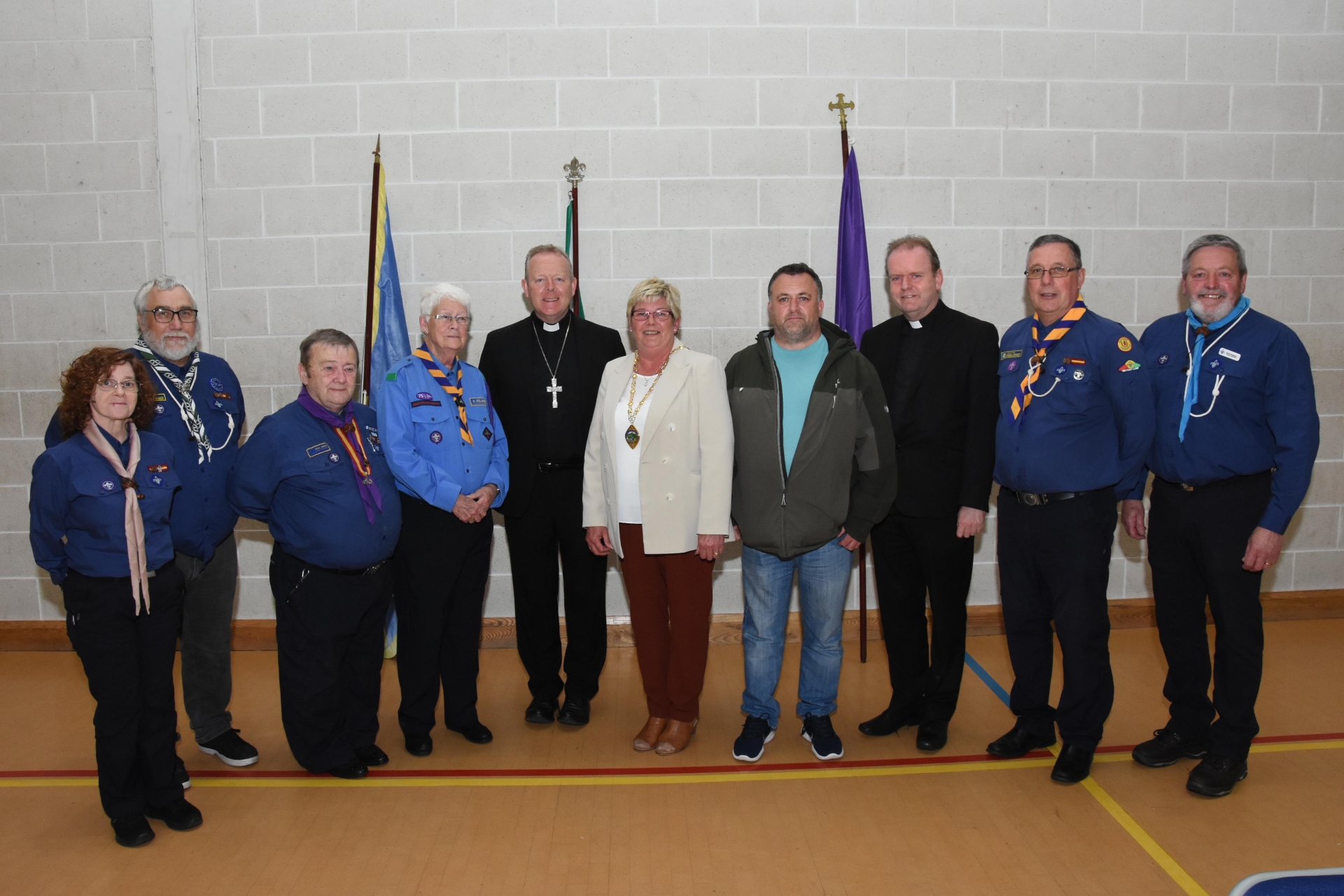 Mary Owens, County Chair, Stephen Clyde, Leader, Joe Corry, Provincial Commissioner, Margaret McGlinchey, Leader, Archbishop Eamon Martin, Deputy Mayor Angela Dobbins, Cllr Gary Donnelly, Fr Joe Gormley, Charlie McChrystal, Group Leader, and Kevin Ferguson, Provincial Support Officer.