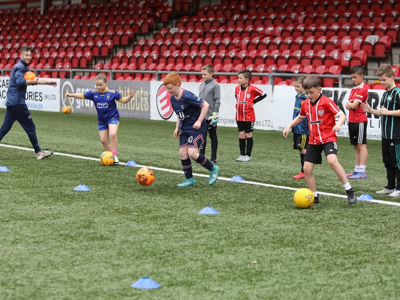 Young footballer testing their skills. (Photos - Tom Heaney, nwpresspics)