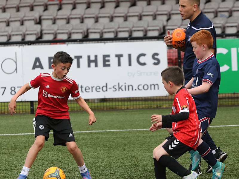 Coach Jack Malone keeps an eye on the play in the U9s group.