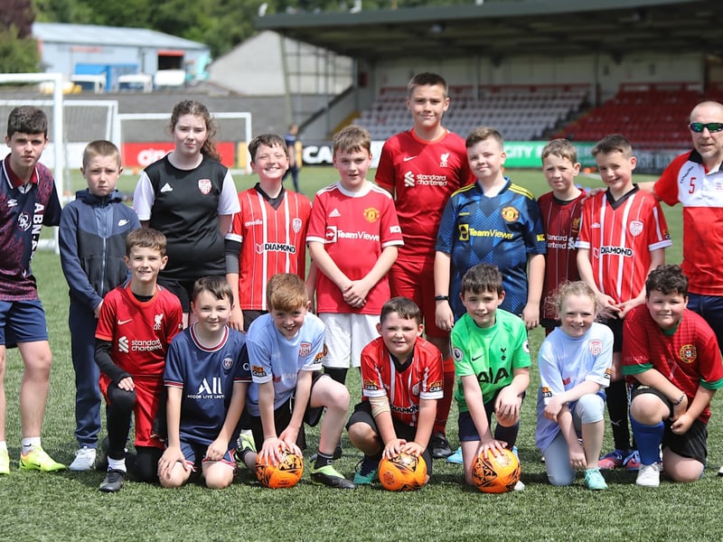The Over 10s with coaches Eoghan Campbell and on right Aaron Rogan senior.
