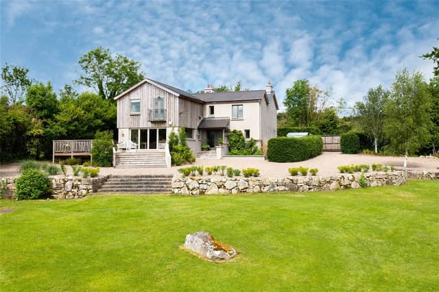 TAP PIC BELOW FOR NEXT PIC Clarahawn House, Graiguenamanagh, Co. Kilkenny, R95 YA25 4 beds - 3 baths - 184m2 ASKING PRICE: €595,000 TAP 'NEXT>' ABOVE FOR NEXT PIC Clarahawn House is situated on the outskirts of the charming market village that is Graiguenamanagh. Located on the meandering River Barrow, the town is rich with history and is considered to be one of the most beautiful areas in the sunny south east of Ireland. The townland name translates in Irish to Gráig na Manach, meaning "Village of the Monks". Graiguenamanagh is home to Duiske Abbey which was the largest Cistercian Abbey in Ireland. With its remarkable combination of mountain views, lush rolling hills, forest and river valleys, Graiguenamanagh offers nature lovers a plentiful feast as well as countless amenities for those keen on outdoor activities. It also has all the day to day amenities: two supermarkets, a Post Office, pharmacies, public houses, restaurants, café and the Cushendale Woollen Mill A 20 minutes drive from Clarahawn House will take you to Thomastown. This lively market town is home to a plethora of pubs, restaurants, cafes and notable points of interest such as Jerpoint Abbey, Kilfane Glen Gardens, and the world-renowned Mount Juliet Golf Course. Set on the western bank of the River Barrow, Clarahawn House is a divine residence positioned within a private oasis of approximately 1.06 ha (2.61 acres). The house enjoys serenity inducing views over the private landscape rolling down to the banks of the Barrow. Clarahawn House is a bright, but cosy waterfront home with sole access to the River Barrow. The residence is well-designed with 4 bedrooms including a superb master suite. There are wonderful reception and entertaining rooms, as well as spaces to work and relax. It is the perfect setting to make it your retreat from the city or your year-round home. This truly wonderful house is bathed in daylight, filling the home with warm hues. The kitchen opens up onto wooden decking, inviting you to have a morning coffee