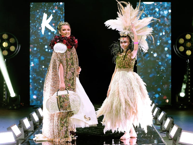 Picture left Genevieve Keane of Ursuline Secondary School,Thurles (Left) The creation 'Acantha' inspired by the story of St Patrick was desIgned and created from potato sacks,curtains,wool and old carpet. Pictured Right Clodagh Ramsey from Wilson Hospital School,Co Westmeath pictured at the Junk Kouture 2022 Final at the Bord Gais Energy Theatre,Dublin. The creation 'Bohemian Pampas Tree' was desIgned Clodagh and fellow student Dimo Tate. The living dress requires daily water,air and light and is made from pampas grass, moss and black grass. Pic Brian McEvoy No Repro fee
