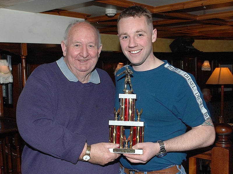 Colum McCullough, referee of the Minor final receiving his award from Peter Bannon.