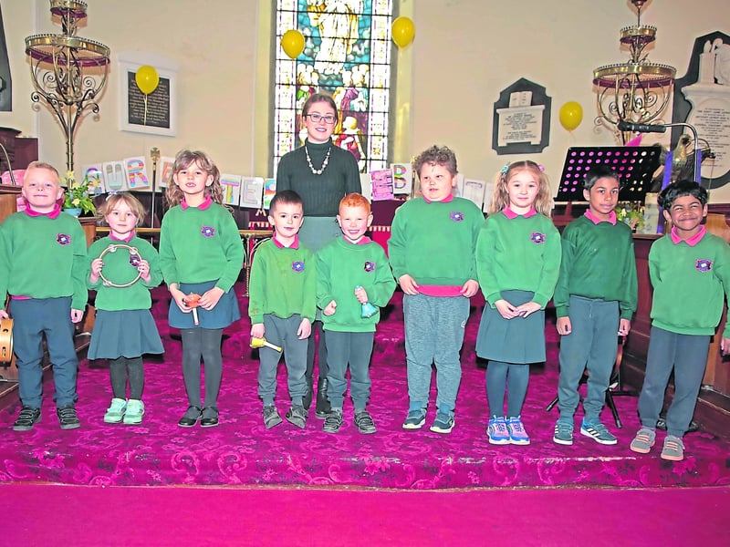 Niamh Columb with pupils from the Junior Room at St John's NS, Longford town