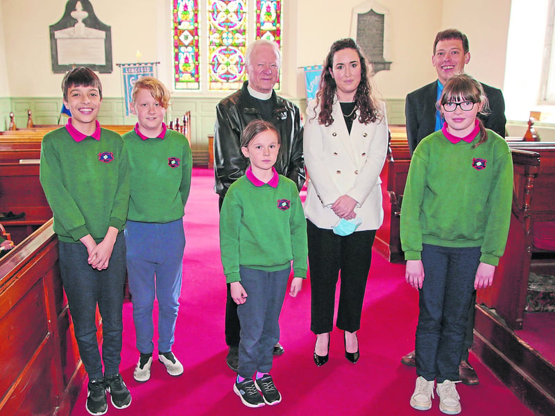 Children from the senior room at St John's NS, Battery Road, Longford, Principal Monica Mulholland, Cannon David Catterall and Rev Simon Scott at the Easter Celebration last week