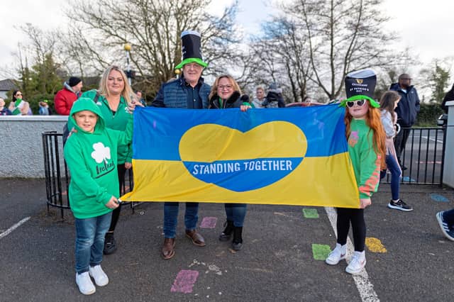 ON A sunny, blustery day, thankfully the only things to fall from the sky were sweets from generous floats. The theme of the St Patrick's Day parade, which kicked off at 2.30pm, was ‘Together Again’. The banner was carried by those who felt the brunt of the pandemic and had to cocoon - members of Carebright and St Joseph’s Foundation. WATCH: Bruff looks its picture postcard best for St Patrick’s Day For more pictures just click 'NEXT'