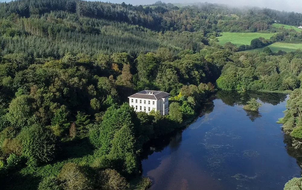 Pouldrew House, Kilmeadan, Waterford is one of the most desirable Georgian mansions in Ireland. It is for sale for €1.85m and is located on 45 acres of beautiful woodland.  