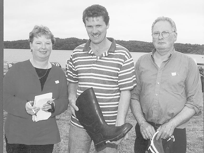 Caption: Great family day at 2001 Dring Summer festival: Angela Hurson, Marty McNerney, the wellie throwing champion and Phil Mulligan