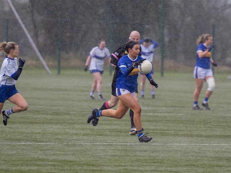 Sarah English of Tipperary tries to persist with tough conditions in Heywood.