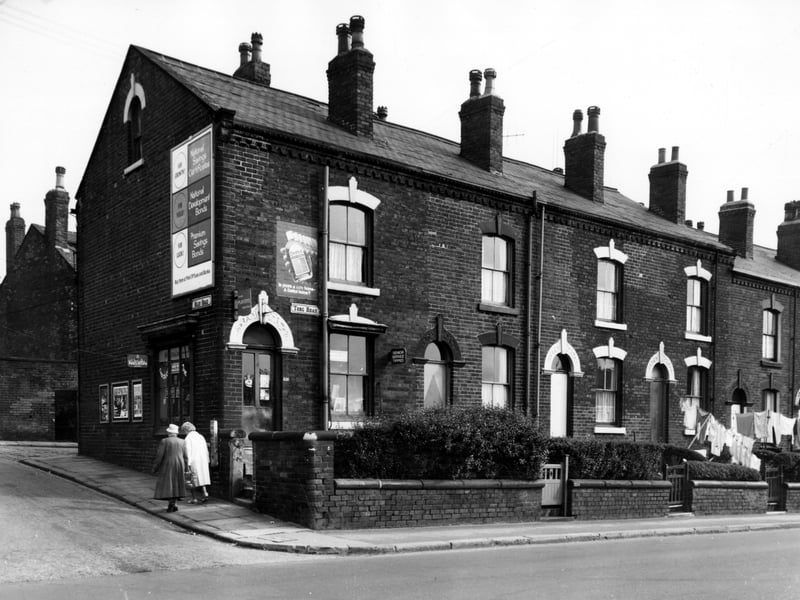 Main Road can be seen on the left edge of this view. Moving right onto Tong Road number 226 on the corner is a grocers business of B.M. Newman. Houses have small front gardens and also have back entrances on Cardwell Street. Included in slum clearance plans for the Armley area.