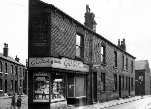 Two boys stand next to a grocers and confectioners on Main Road in August 1966. Bright Terrace can seen in the background.