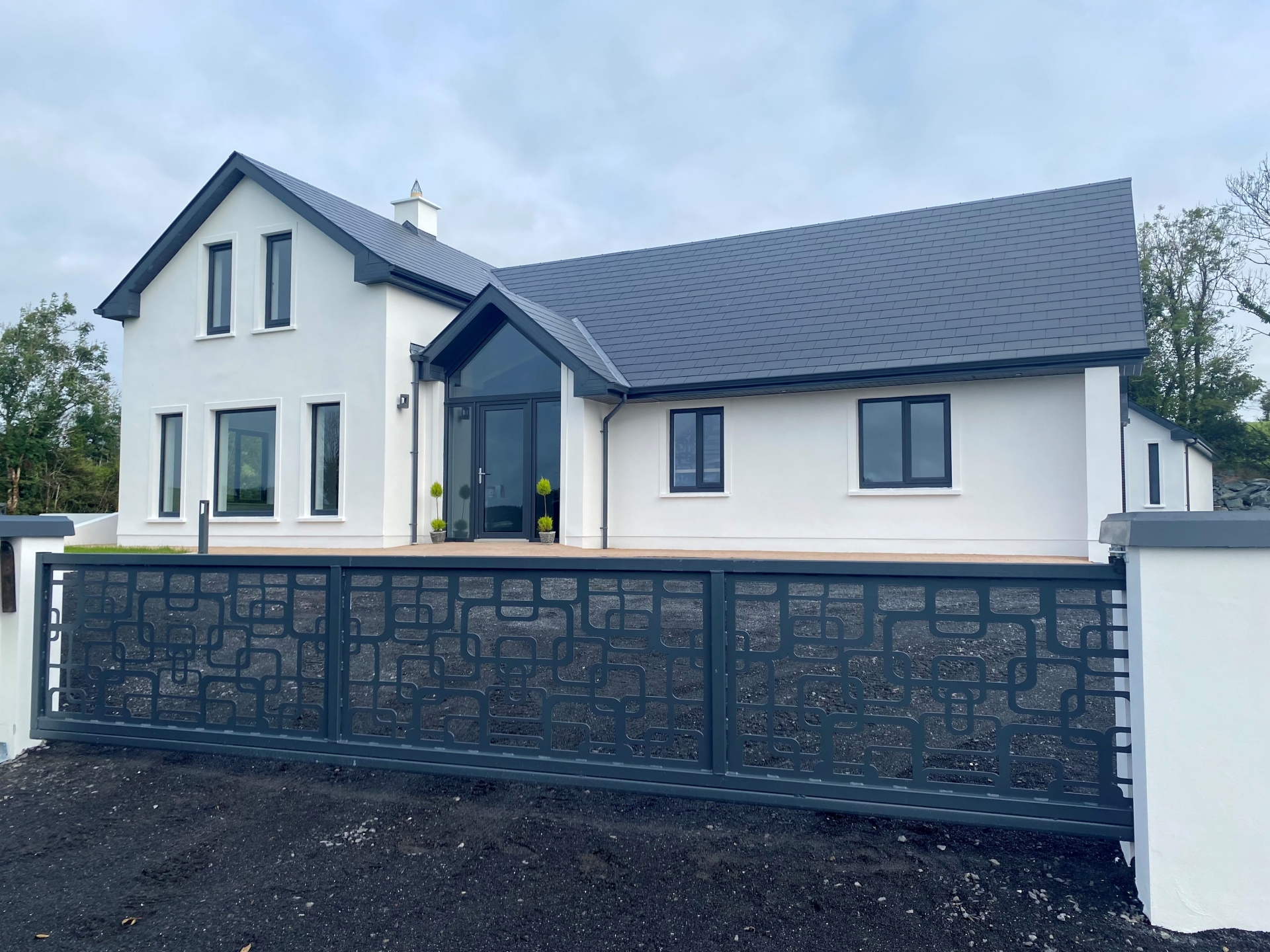A fantastic house at Toome, Carrigallen has gone viral with tens of thousands viewing this stunning home which has been brought to the market by Gordon Hughes Estate Agents with a price tag of €299,000. This magnificent A3 energy rated property with roof height glass door entrance comes to market offering the discerning buyer an opportunity to purchase a brand new home (circa 208 sq.m.) which is ready for immediate occupation. Finished to an exceptionally high standard throughout the property boasts an endless amount of features & is conveniently situated only 4km from the nearby village of Carrigallen & 10km from the town of Ballinamore. Only recently completed it is ideally suited for use as a family home & is sited on approx. 0.70 acres (folio no:LM7634F) of landscaped grounds. The accommodation in this property comprises of the following; Hallway, living room, office/playroom, kitchen/dining room, utility room, bathroom & No.4 bedrooms (2 en-suite). Some of the many features include; Steel hollow stairs & timber threads with stainless steel handrail & toughened glass, A3 energy rated family home (low energy bills), Integrated appliances in kitchen, curved breakfast seating area, dropped curved ceilings, detached garage with electric roller shutter door, paved patio area with outside lighting & imprinted concrete footpath, galvanised & powder coated sliding gate (wired for electric). Viewing is must nd strictly by appointment only with sole selling agent. AMV: €299,000. Features Steel hollow stairs & timber threads with stainless steel handrail & toughened glass A rated family home (low energy bills) Roof height Glass door entrance Integrated appliances in kitchen Curved breakfast seating area & dropped curved ceilings in kitchen area Detached garage with electric roller shutter door Paved patio area with outside lighting Sandstone coloured imprinted concrete footpath Galvanised & powder coated sliding gate (wired for electric). For more details contact: Gordon Hughes Estate Agents Main Street