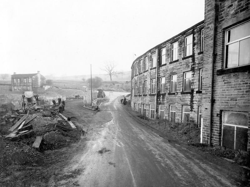 Union Bridge on Roker Lane showing work in progress. Workmen and plant equipment can be seen. Union Mills can be seen on the right. Pictured in November 1939.