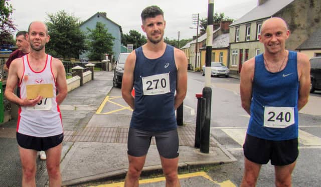 Use to navigate photos Two of the four course records were broken by substantial margins when the Ballinamore Open 5K and 10K Road Races were run off in unexpectedly benign conditions on Friday evening last. Sligo AC runner Michael Morgan, one of the leading young runners in the country on the eve of his departure for Providence University on Athletic Scholarship, smashed Alan Kelly of St Ronan’s ten year old 5K record by no less than 95 seconds when coming home in 15.20. He was followed home in third position overall by Kinlough Olympian Breege Connolly who clocked 17.17 to win the Women's race by over three minutes. In the process she shattered the previous figure of 19.43 set by Sharon Grant of Portlaoise in 2016. Ballinamore's Isobel creates history with stunning victory in Seven Sisters Skyline 55 Colin Griffin, although not fully recovered from recent injury, was still able to take the 10K victory for the third successive year after a tough battle with Kevin Donagher of Rathfarnham WSAF over the first 5K. The Women's race was won by Fiona Gettings of Longford AC. Heavy rain was predicted all week and this was one of the causes of the lower than usual turnout among local runners and joggers. The number of visiting runners kept up as athletes starved of competition over the past eighteen months took the opportunity presented by a choice of two races and despite the fact that covid regulations made many of the arrangements of recent years impossible many were loud in their praise of a race well run. The weather also played a part with the continuous heavy rain not arriving apart from a badly timed shower as the runners took their starting positions. It did not last however and the race was run in conditions free from rain and wind. It is hoped that Ballinamore Family Festival will be back next year and the races will again revert to their position in the week’s programme. UPDATED: Gerard O'Donnell joins Leitrim athletics Olympic list as seven becomes eight Ballinamore Athletic Club are very