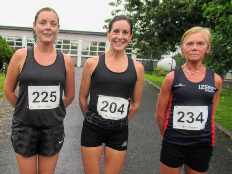 Use to navigate photos Two of the four course records were broken by substantial margins when the Ballinamore Open 5K and 10K Road Races were run off in unexpectedly benign conditions on Friday evening last. Sligo AC runner Michael Morgan, one of the leading young runners in the country on the eve of his departure for Providence University on Athletic Scholarship, smashed Alan Kelly of St Ronan’s ten year old 5K record by no less than 95 seconds when coming home in 15.20. He was followed home in third position overall by Kinlough Olympian Breege Connolly who clocked 17.17 to win the Women's race by over three minutes. In the process she shattered the previous figure of 19.43 set by Sharon Grant of Portlaoise in 2016. Ballinamore's Isobel creates history with stunning victory in Seven Sisters Skyline 55 Colin Griffin, although not fully recovered from recent injury, was still able to take the 10K victory for the third successive year after a tough battle with Kevin Donagher of Rathfarnham WSAF over the first 5K. The Women's race was won by Fiona Gettings of Longford AC. Heavy rain was predicted all week and this was one of the causes of the lower than usual turnout among local runners and joggers. The number of visiting runners kept up as athletes starved of competition over the past eighteen months took the opportunity presented by a choice of two races and despite the fact that covid regulations made many of the arrangements of recent years impossible many were loud in their praise of a race well run. The weather also played a part with the continuous heavy rain not arriving apart from a badly timed shower as the runners took their starting positions. It did not last however and the race was run in conditions free from rain and wind. It is hoped that Ballinamore Family Festival will be back next year and the races will again revert to their position in the week’s programme. UPDATED: Gerard O'Donnell joins Leitrim athletics Olympic list as seven becomes eight Ballinamore Athletic Club are very