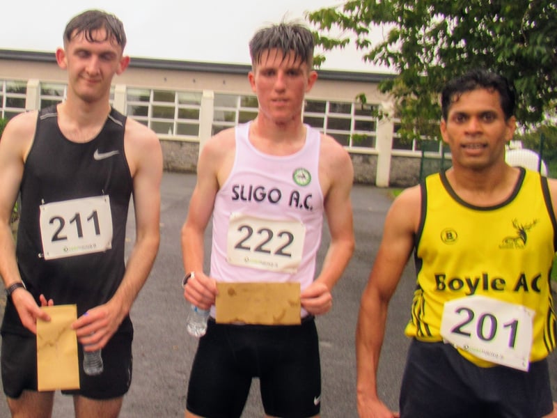 Use to navigate photos Two of the four course records were broken by substantial margins when the Ballinamore Open 5K and 10K Road Races were run off in unexpectedly benign conditions on Friday evening last. Sligo AC runner Michael Morgan, one of the leading young runners in the country on the eve of his departure for Providence University on Athletic Scholarship, smashed Alan Kelly of St Ronan’s ten year old 5K record by no less than 95 seconds when coming home in 15.20. He was followed home in third position overall by Kinlough Olympian Breege Connolly who clocked 17.17 to win the Women's race by over three minutes. In the process she shattered the previous figure of 19.43 set by Sharon Grant of Portlaoise in 2016. Ballinamore's Isobel creates history with stunning victory in Seven Sisters Skyline 55 Colin Griffin, although not fully recovered from recent injury, was still able to take the 10K victory for the third successive year after a tough battle with Kevin Donagher of Rathfarnham WSAF over the first 5K. The Women's race was won by Fiona Gettings of Longford AC. Heavy rain was predicted all week and this was one of the causes of the lower than usual turnout among local runners and joggers. The number of visiting runners kept up as athletes starved of competition over the past eighteen months took the opportunity presented by a choice of two races and despite the fact that covid regulations made many of the arrangements of recent years impossible many were loud in their praise of a race well run. The weather also played a part with the continuous heavy rain not arriving apart from a badly timed shower as the runners took their starting positions. It did not last however and the race was run in conditions free from rain and wind. It is hoped that Ballinamore Family Festival will be back next year and the races will again revert to their position in the week’s programme. UPDATED: Gerard O'Donnell joins Leitrim athletics Olympic list as seven becomes eight Ballinamore Athletic Club are very