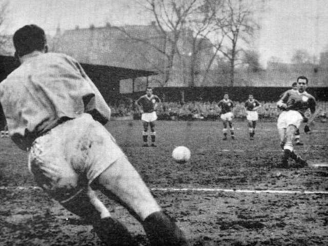 A look back to Shrewsbury and the Gay Meadow in April 1961, where Arthur Rowley scored a penalty against Walsall to equal Dixie Dean’s long-standing league goalscoring record. Played in front of an all-time record crowd for the fixture, the match ended 2–1 to Walsall, who secured promotion to the Second Division for the first time in 60 years.