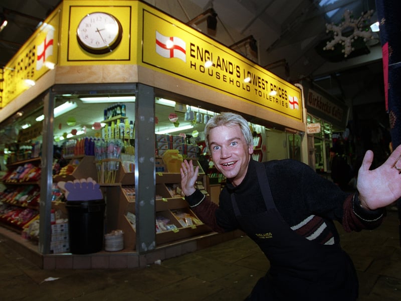 Neil Goodwin on his stall, 'England's Lowest Prices',   at Leeds Market, in 1998