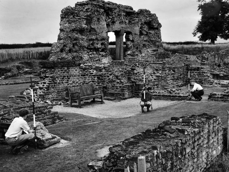 Wroxeter Roman City, 1961, where amateur archaeologists took part in a “Roman holiday” in the heart of the Shropshire countryside. On a course in Romano-British excavation techniques, participants were busy digging at the site of Viroconium, uncovering a number of interesting finds. The original caption notes that Viroconium, near Shrewsbury, lay on the main route used by the Romans during their invasion of the Midlands and North Wales. A handwritten note on the print also references the older spelling “Uriconium”, reflecting how the site was once more commonly known.