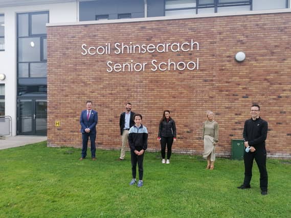 Pictured with Grace are her dad Stewart, Principal Noel Daly, Principal Roisín Brennan, Deputy Principal Dermot O’Connor and her teacher Cathy Moloney.