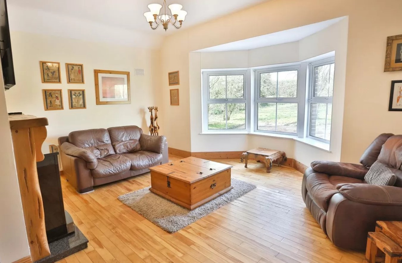The accommodation includes four large bedrooms, each with its own ensuite, three reception rooms, a spacious kitchen, a full bathroom and a utility room.
