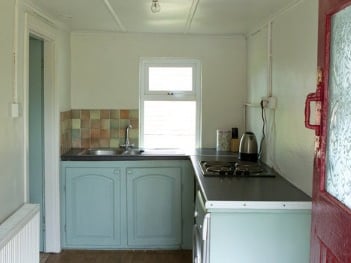 The accommodation consists of a sitting room, kitchen, bathroom and bedroom.