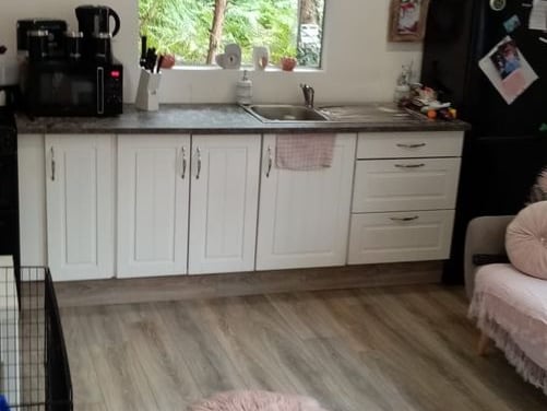 The prefab is sized 30m x 12m and has a Kitchen/Living area, a Bedroom and a Bathroom.