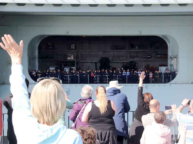  HMS Queen Elizabeth looks glorious as she returns to Portsmouth after major revamp  on Monday 27th April 2026

Pictured: People at the Round Tower watching as she comes in 

Picture: Habibur Rahman