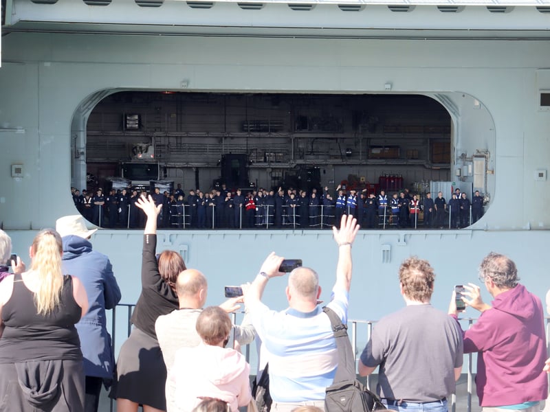  HMS Queen Elizabeth looks glorious as she returns to Portsmouth after major revamp on Monday 27th April 2026

Pictured: People at the Round Tower watching as she comes in 

Picture: Habibur Rahman