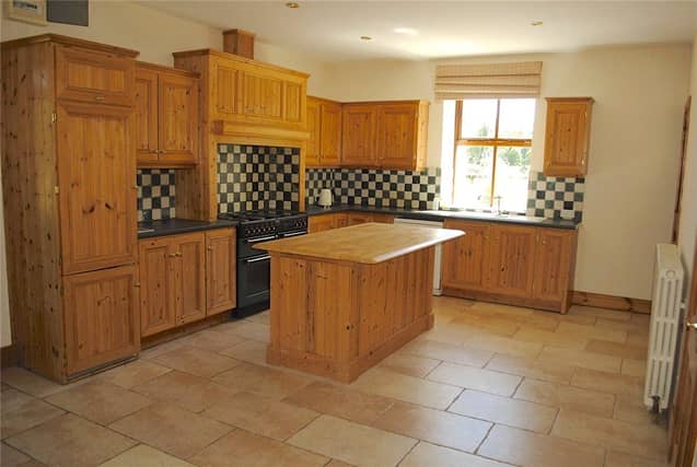 Inside the property is immaculate throughout with all the main rooms on the ground floor being the width of the house. The kitchen is at the heart of the property and has solid pine fitted units with a matching island.
