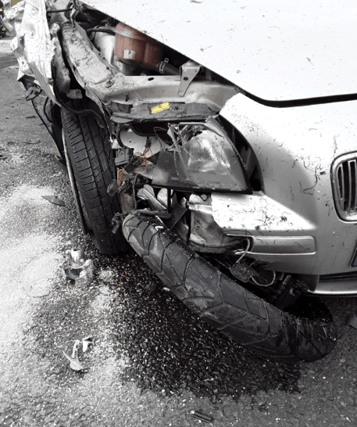 This was the scene of a collision between a motorcyclist and a car yesterday evening.