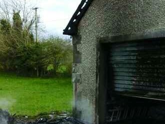 The caravan could not be saved but the fire was prevented from spreading to a garage, which received smoke damage. 