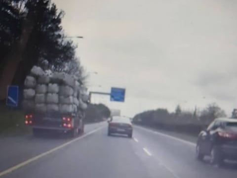 It landed in the middle of the lanes and motorists had to veer to avoid the obstacle. 