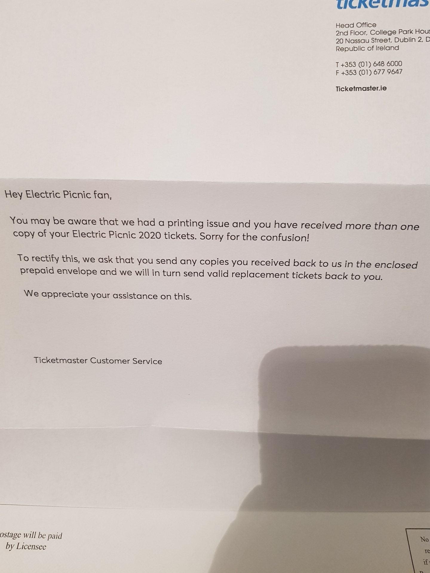 The letter says "Hey Electric Picnic fan, you may be aware that we had a printing issue and you have received more than one copy of your Electric Picnic 2020 tickets. Sorry for the confusion! To rectify this, we ask that you send any copies you received back to us in the enclosed prepaid envelope and we will in turn send valid replacement tickets back to you. We appreciate your assistance on this."