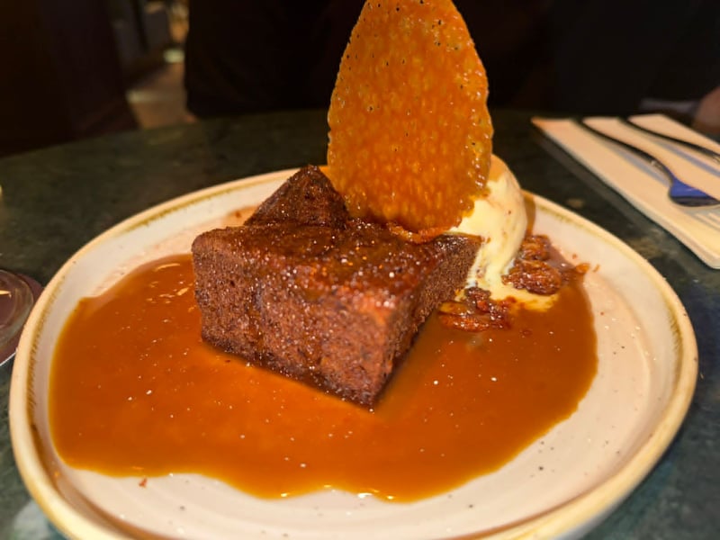 The warm hydro sticky toffee pudding served with salted caramel sauce and honeycomb ice cream.