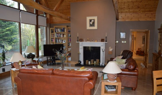 The main house boasts four bedrooms, three bathrooms and the latest in modern living with unique ceiling height windows and rear decking.