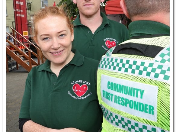 [caption id="attachment_170882" align="alignnone" width="583"] Kildare Town Community First Responders Joanne and John Pender with 'backup' from Cathal Keogh at the Kildare Town Derby Festival Parade last Sunday.[/caption]