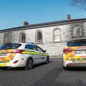 Garda cars outside a courthouse