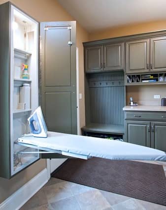 5. Put the ironing board on the wall...