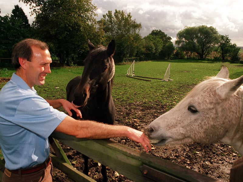 O tober 1997 and ex-footballer Chris Topping   is pictured relaxing at home at Cliffe with two of the family horses  Mac, left, and Giles. He made more than 400 appearances for York City between 1968 and 1978.